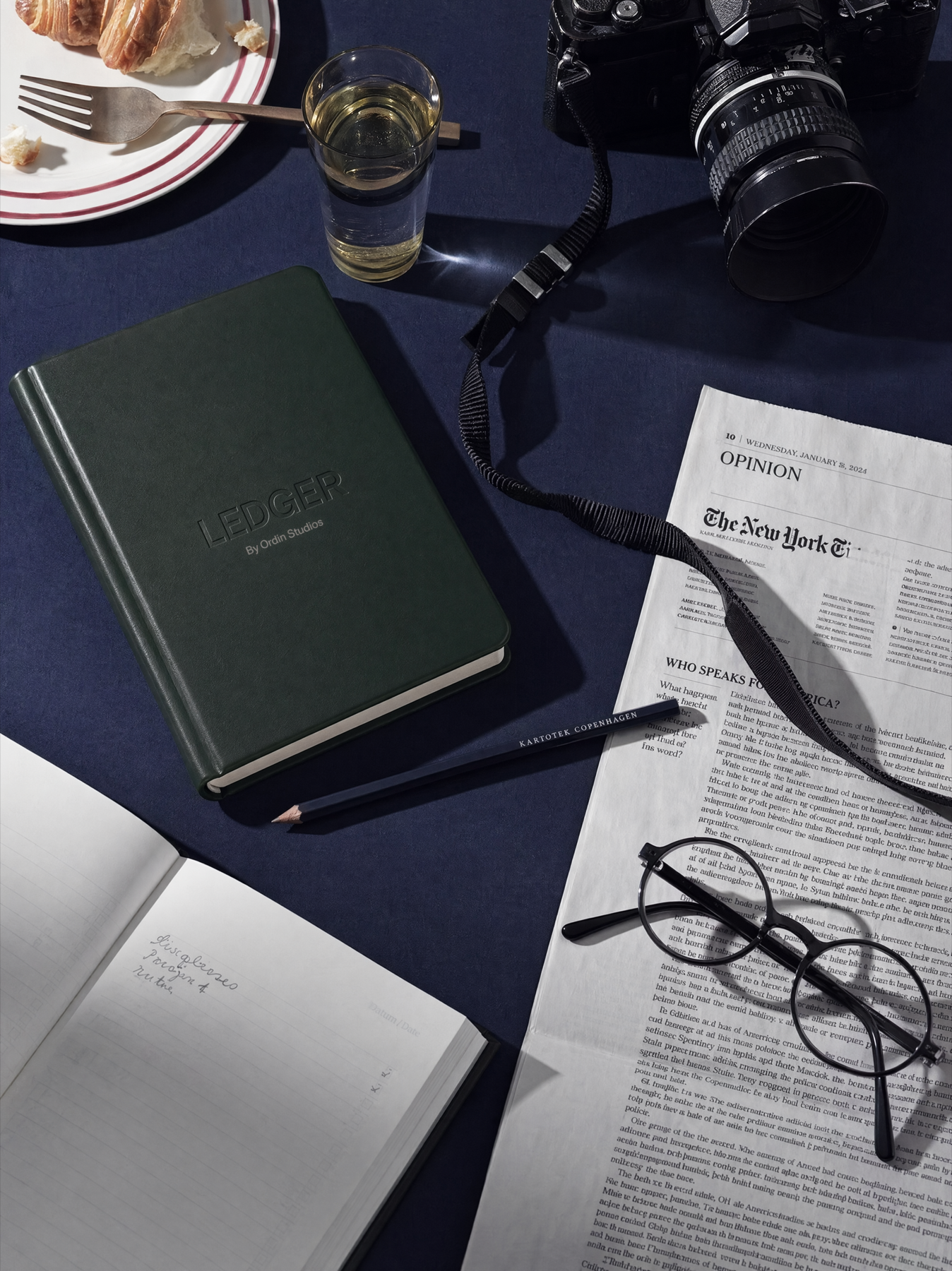 The Ledger closed on a desk -- the object