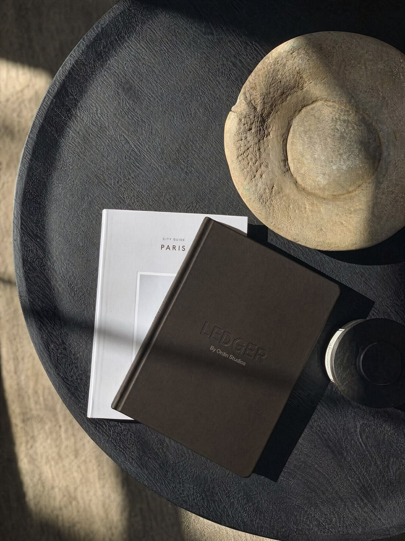 The Ledger hardcover with ribbon marker