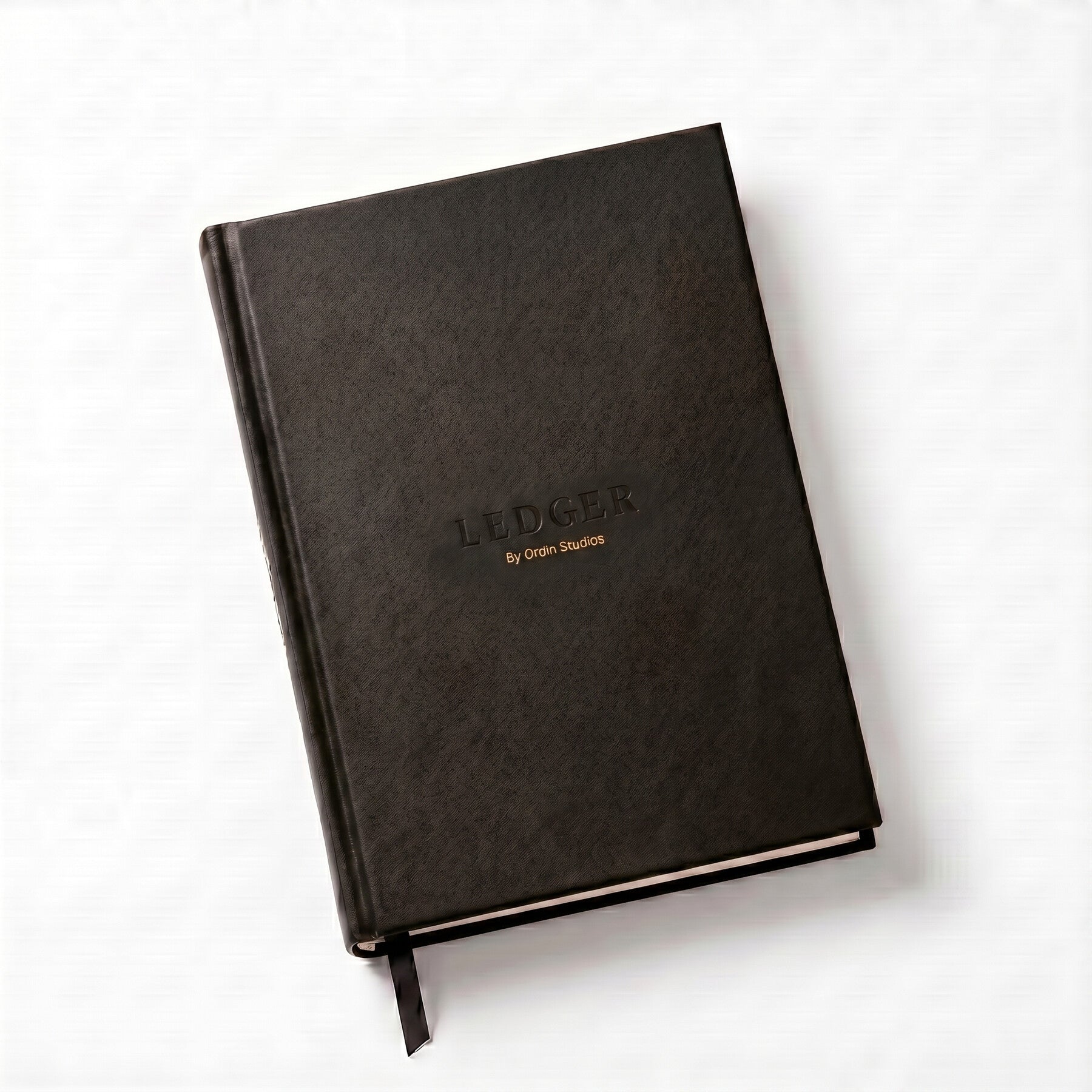 The Ledger, black hardcover, in low light