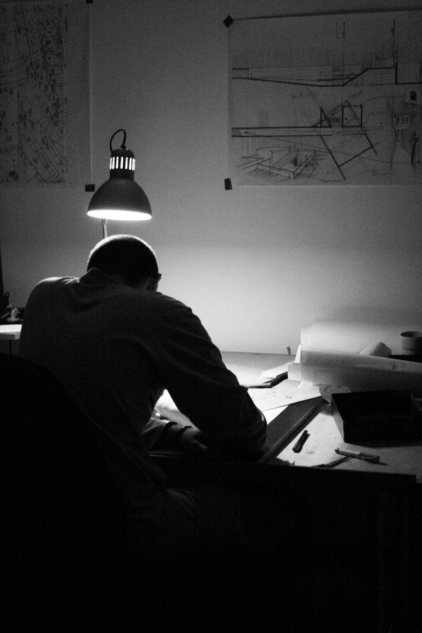 The Ledger open on a desk under a lamp, the first dashboard being filled