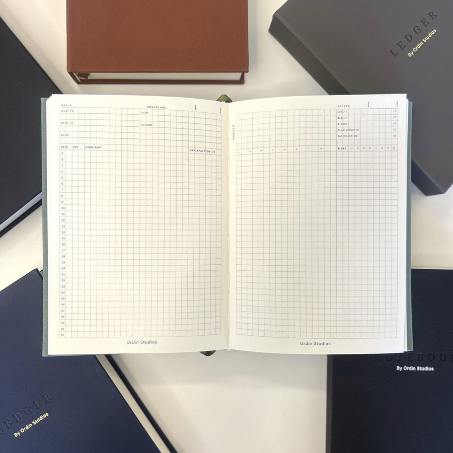 An open Ledger monthly dashboard spread, unwritten, surrounded by the five cover colorways.